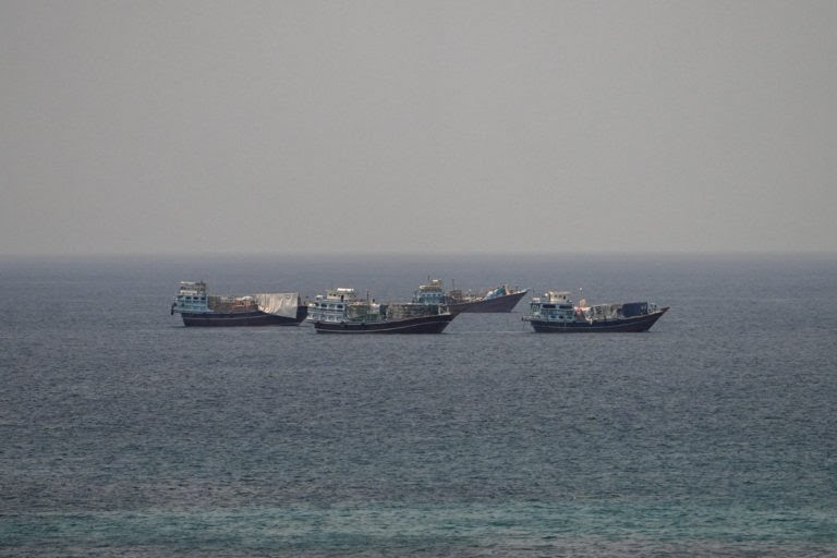 Iran warns oil tankers on Hormuz routes, threatens forceful response